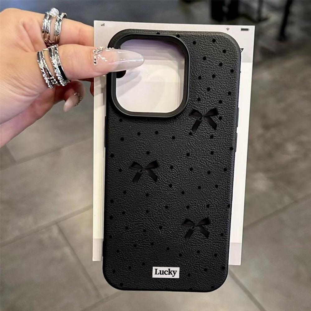 Black polka dot bow is suitable for iPhone17 Pro leather pattern mobile phone case 17 all-inclusive 15 large holes 16 soft case factory