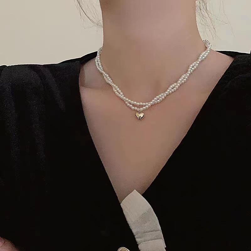 Millet glass pearl twist love high sense niche light luxury women's new collarbone chain Internet celebrity explosion necklace jewelry