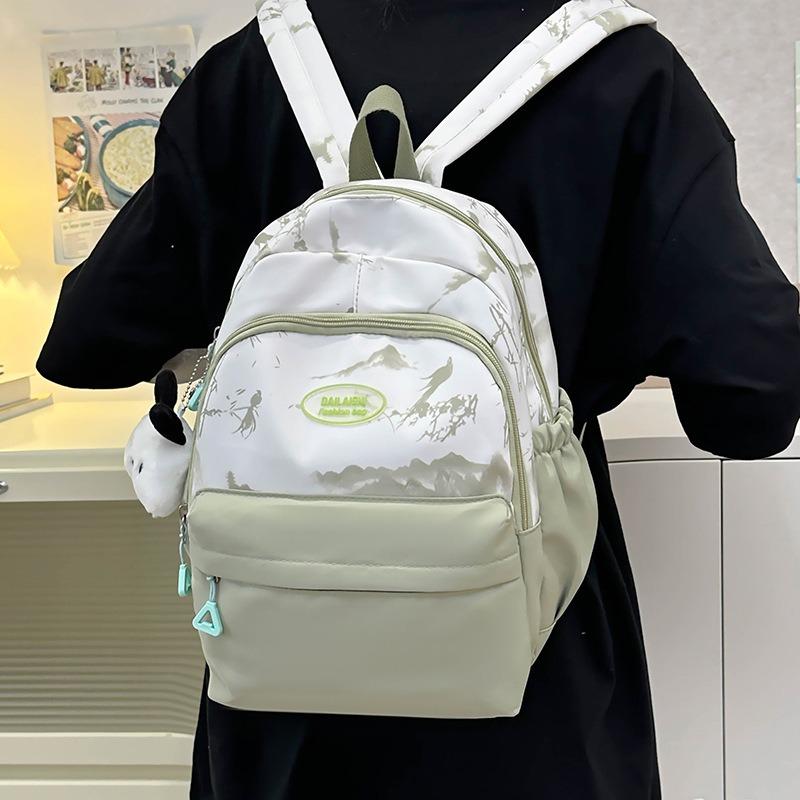 Solid color schoolbag for female junior high school students, high-value college style backpack for students, ink painting versatile backpack