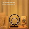 Modern and Minimalist Ring-shaped Desktop and Bedside Lamp. It Is Powered by USB and Has the Function of Three-color Dimming.