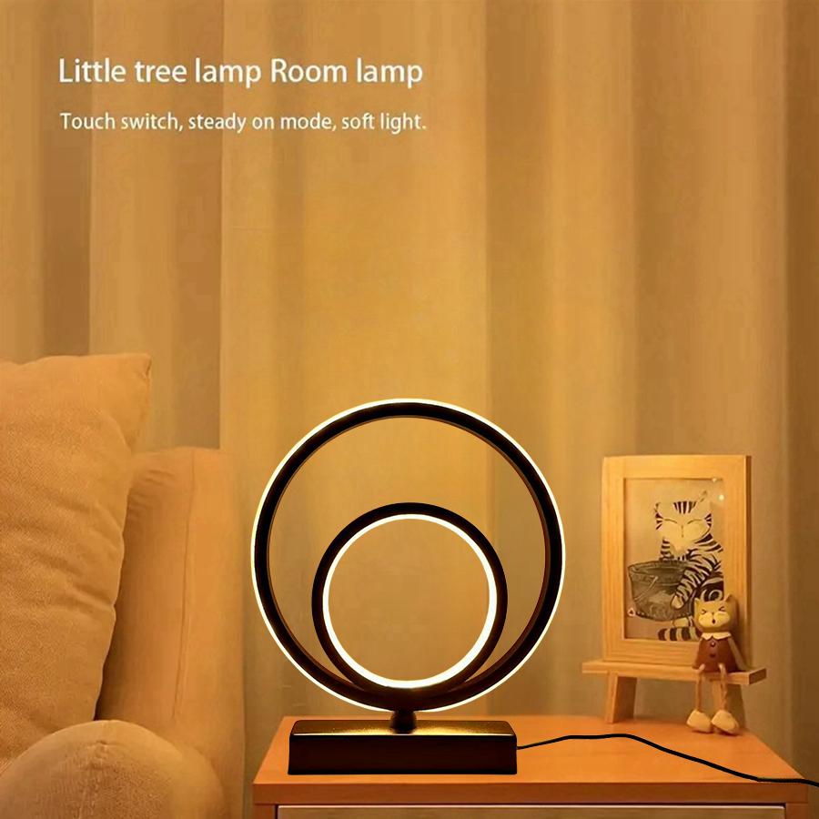 Modern and Minimalist Ring-shaped Desktop and Bedside Lamp. It Is Powered by USB and Has the Function of Three-color Dimming.
