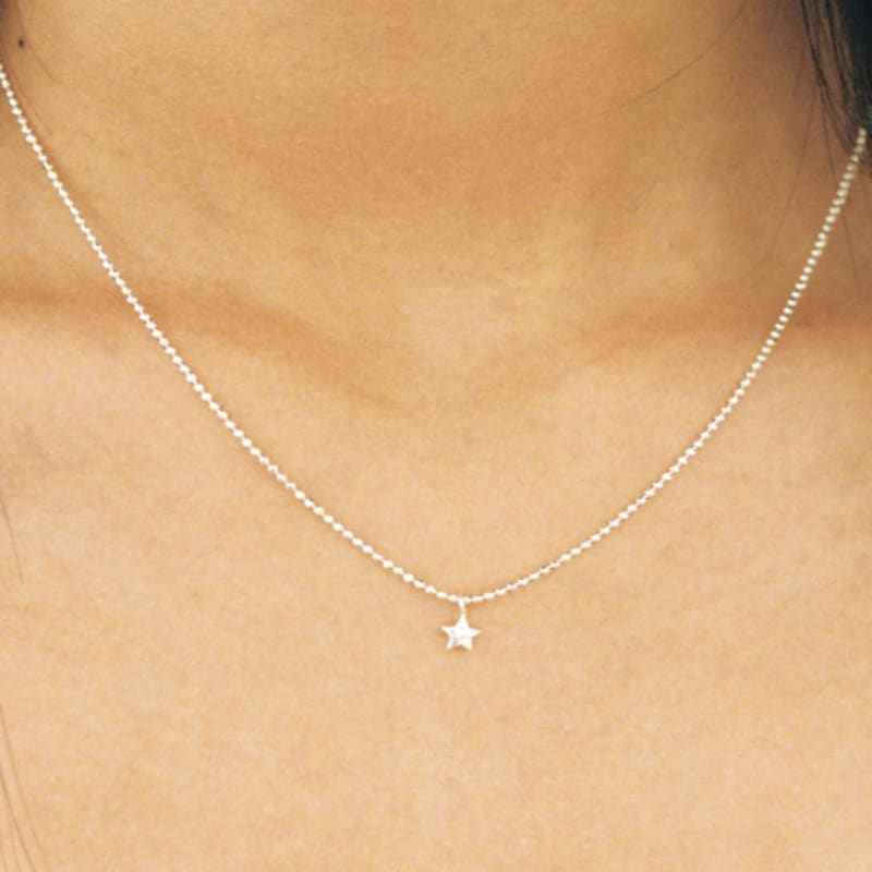 

Fruta tiny star silver necklace(siver 925) ONE