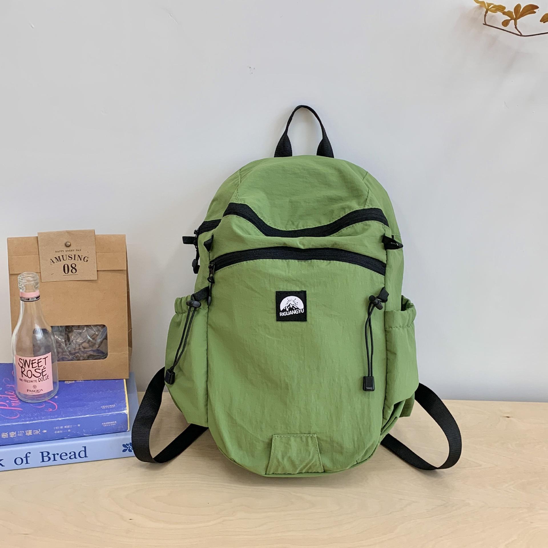

Жіночий рюкзак великої місткості 2024 р. Нова повсякденна тканинна сумка Портативний учнівський шкільний рюкзак Преміум для подорожей зелений