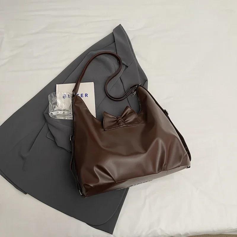 Modische Wollhandtasche für Damen neue einzelne Schulter Bogenmode Pendlerrucksack