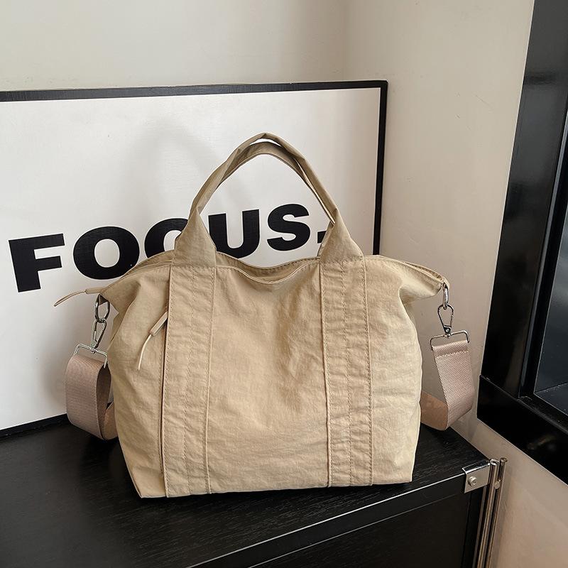 

Japanese-style minimalist tote bag, versatile2026New model large-capacity canvas tote bag for women, shoulder and crossbody hand хаки