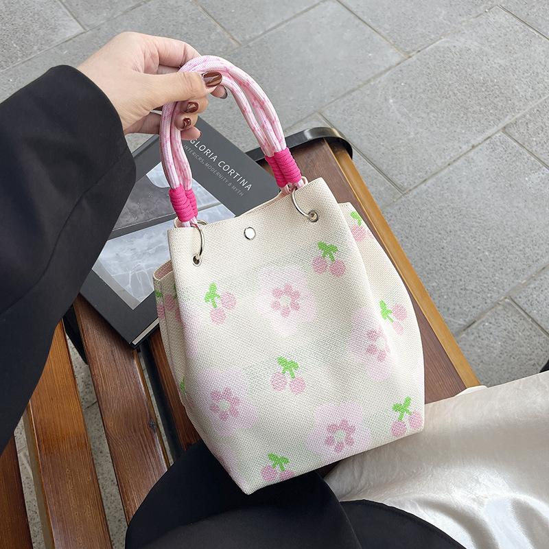 

Summer new niche knitted handbag women s large-capacity fashion handbag light luxury high-value bucket bag