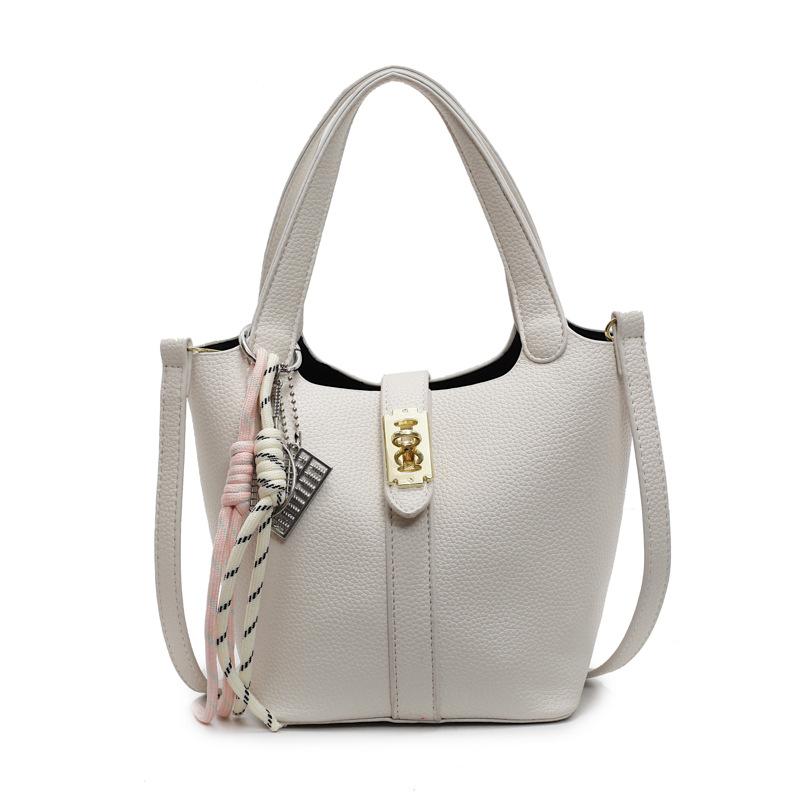 This Year's Popular Simple Ou Ruofeng Lychee Pattern Hand Carrying Bucket Bag Fashion Temperament Versatile High Sense Messenger Women's Bag