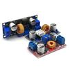 XL4015 5A DC-DC Konverter 4-38V - 1.25-36V Állítható Leszálló Modul Hűtőbordával Leszálló Modul XL4015 4~38v 96%