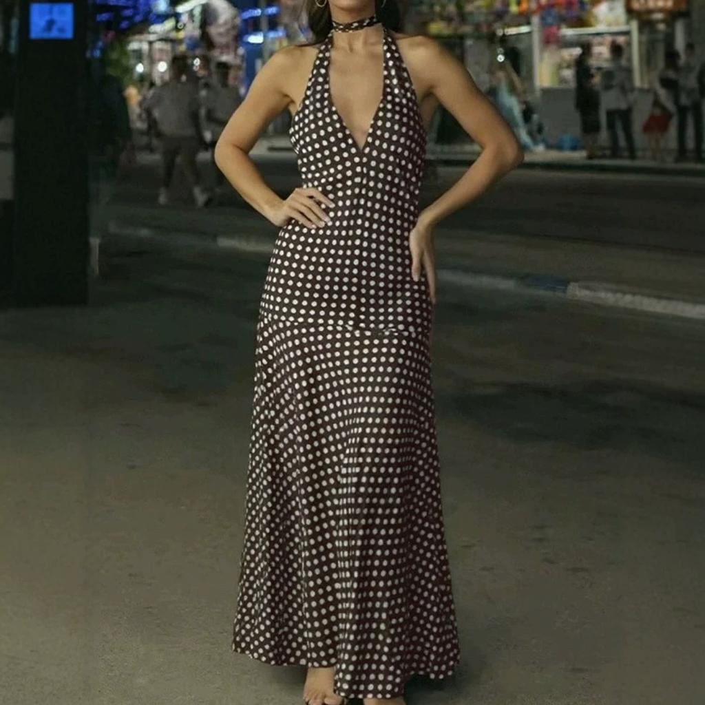 European and American new retro polka dot holiday dress, neck deep V big halter pendant big pendulum long dress