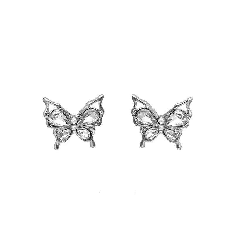 

Super fairy temperament butterfly crystal earrings women s liquid metal light luxury exquisite stud earrings unique sense minimalist earrings