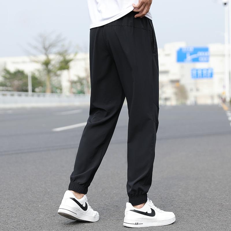 Li-Ning Pantalones Casuales Cómodos Transpirables Elásticos con Logo de Secado Rápido para Hombre YYKV139-11