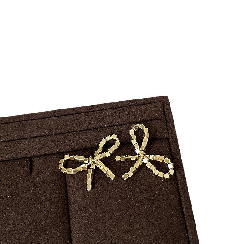 Sparkling Metal Bow Earrings Women'S Niche Design Personality Simple Temperament Versatile Fashion Earrings