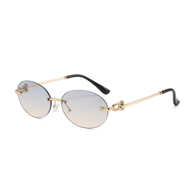 2025 Trendy Retro Rimless Metal Sunglasses: European & American Style UV Protection for Women
