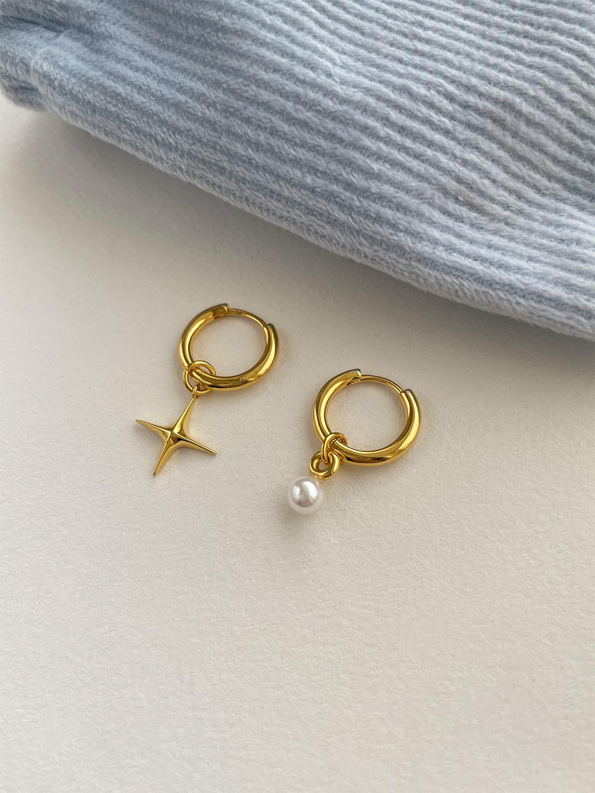 

Retro pearl earrings women s exquisite niche high-end sense four-pointed star silver needle earrings asymmetrical design stud earrings new 925 silver needle