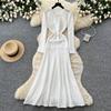 Pink knitted dress women's long-sleeved A-shaped skirt high waist and thin commuter temperament skirt small fragrant style long skirt