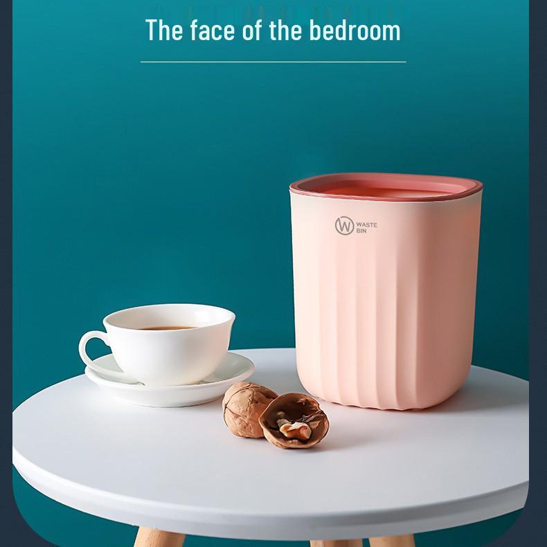 Minimalist Mini Desktop Trash Can for Fruit Peels - Lightweight, Small Storage Bin for Bedroom or Coffee Table.