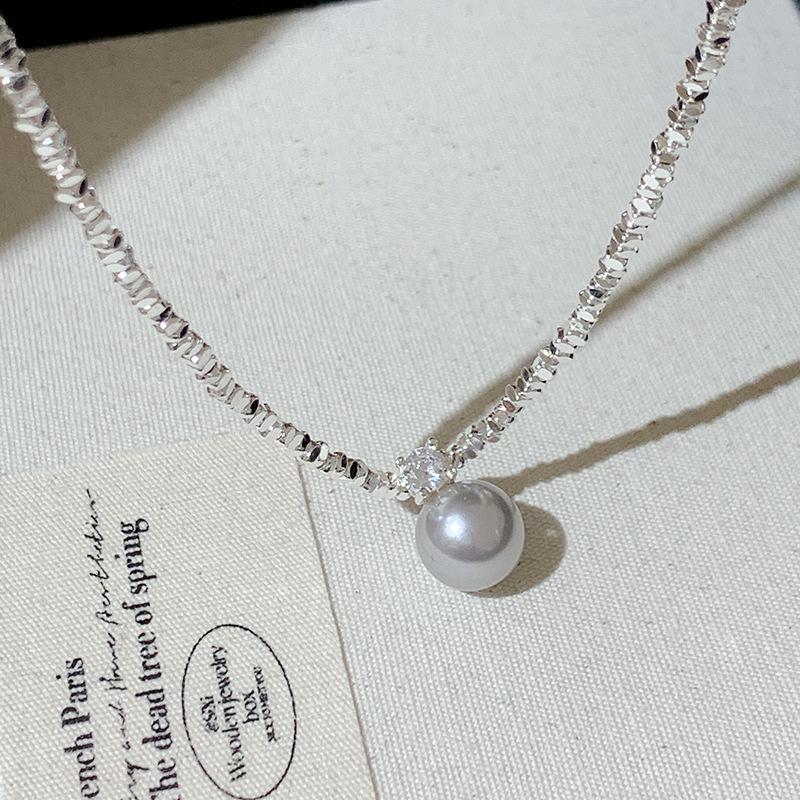 

Серебряное ожерелье-чокер с жемчугом и цирконом - Женское ювелирное украшение в стиле легкой роскоши