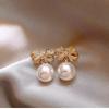 2024 Korean Pearl Bow Stud Earrings - Versatile and Trendy High-End Fashion Drop