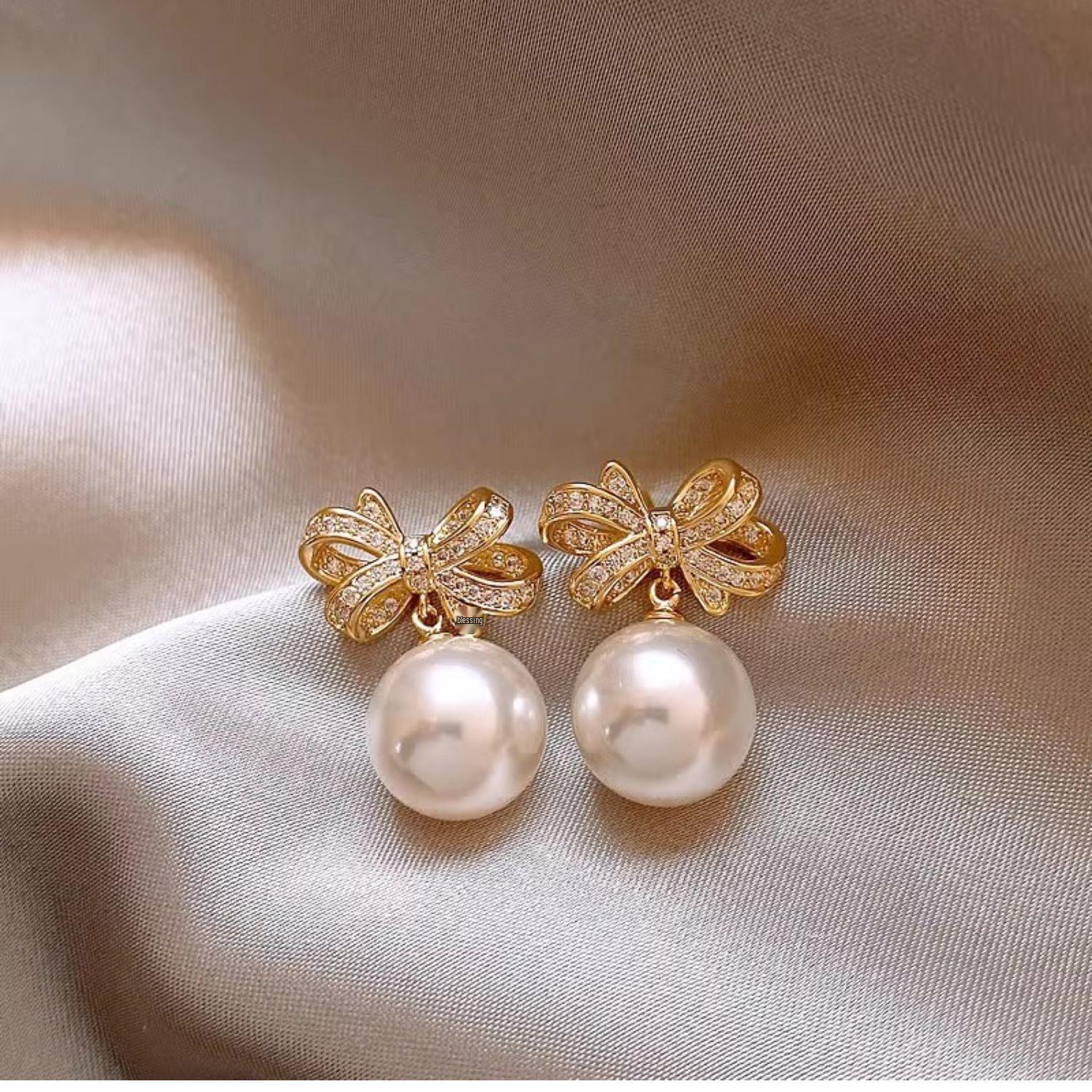 2024 Korean Pearl Bow Stud Earrings - Versatile and Trendy High-End Fashion Drop E0876