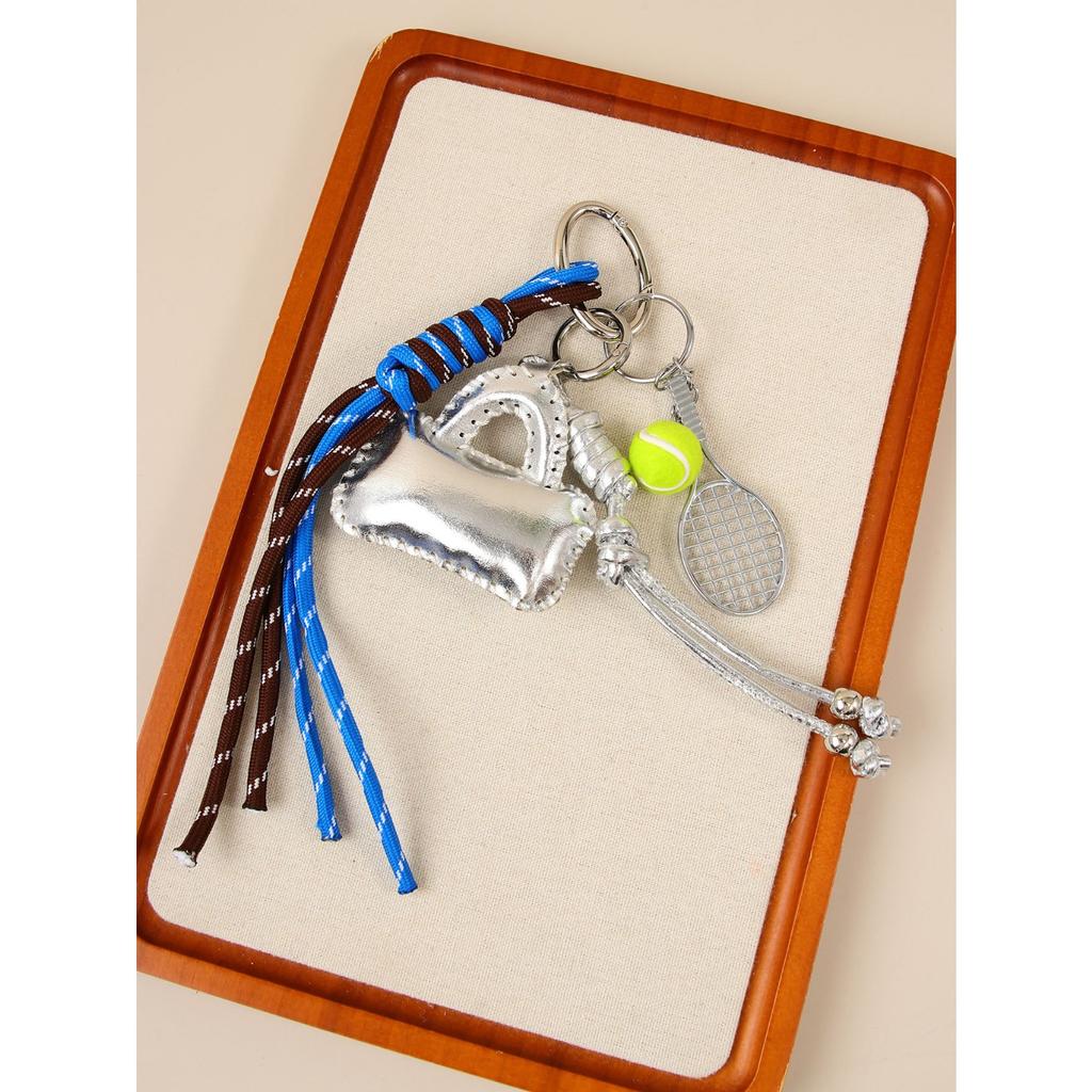 It is the original design of ins wind laser leather, high-end exquisite small bag pendant, keychain, schoolbag pendant.