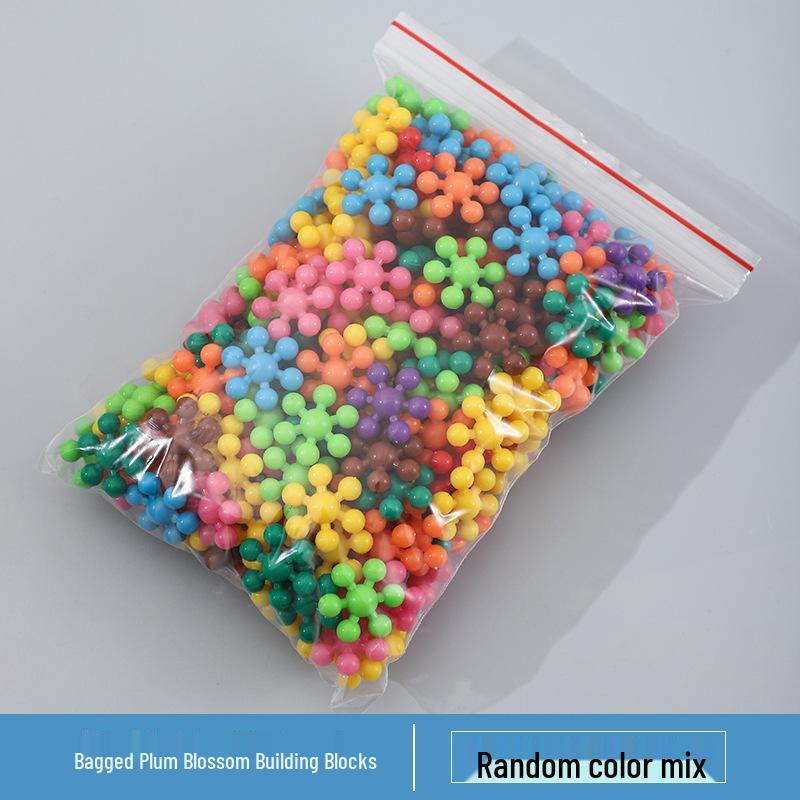 Plum Blossom Rotating Snowflake Building Blocks: 3D Interlocking Educational Toys for Kindergarten