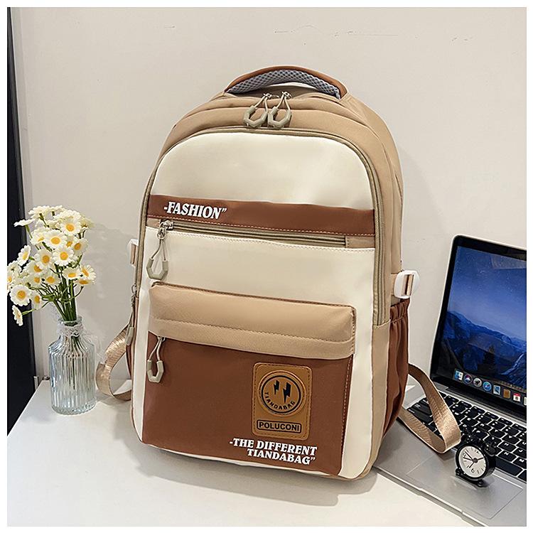 Hot-selling retro tooling wind contrasting color backpack male and female junior high school students versatile tide large-capacity schoolbag