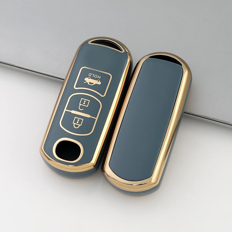 Husă cheie cu ramă aurie pentru modelele Mazda CX-30, Atez, CX-4, CX-5, CX-8 cu 2/3 butoane