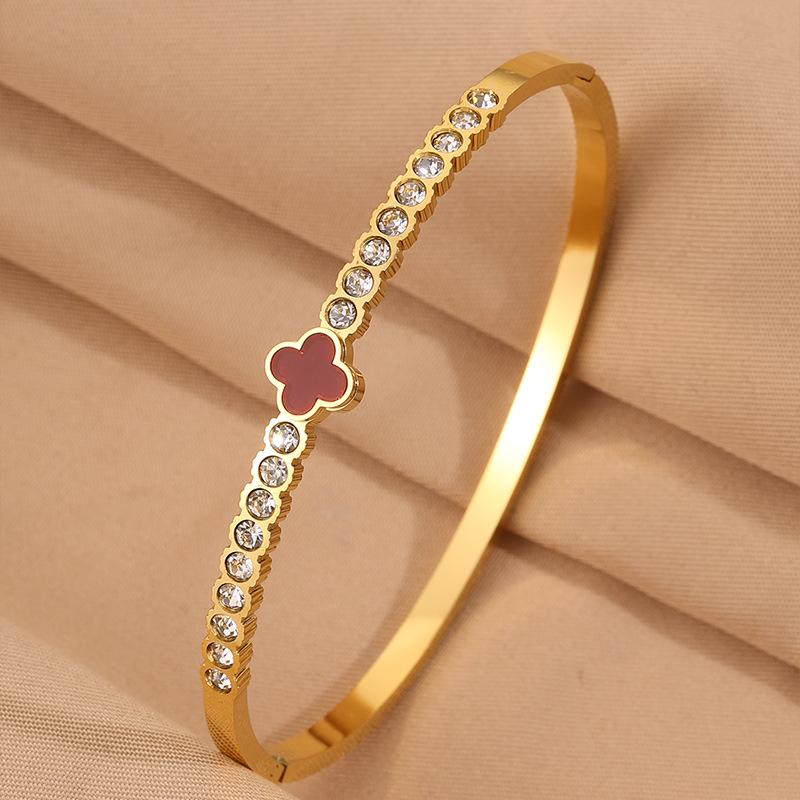 Titanium steel  women's light luxury high-end sense four-leaf flower with diamonds does not fade lucky grass open  