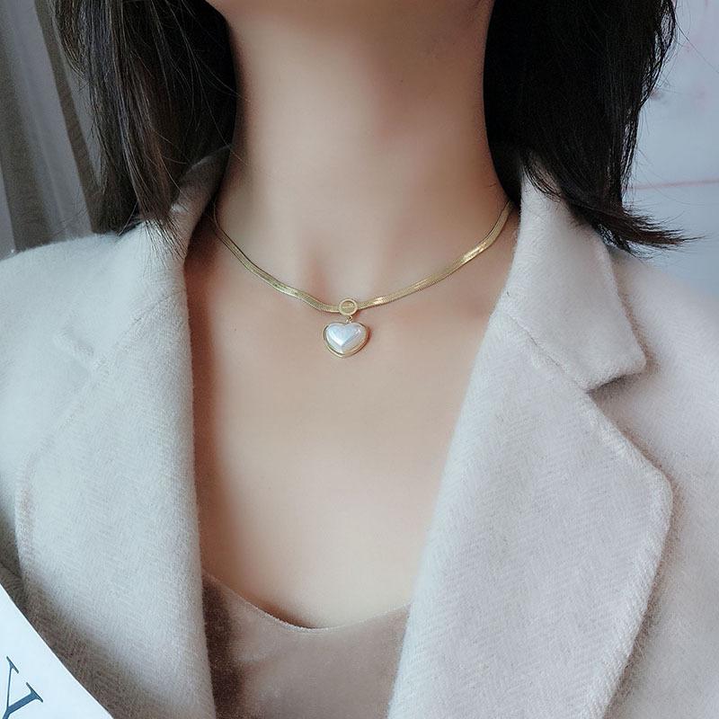 Minimalist Clavicle Necklace: Japanese & Korean Style, Luxurious Real Gold-Plated Titanium Steel Pendant for Women