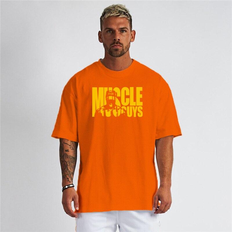 Muscleguys Summer Short Sleeved Men's Fitness Loose T-shirt  Round Neck Quick Drying Half Sleeve