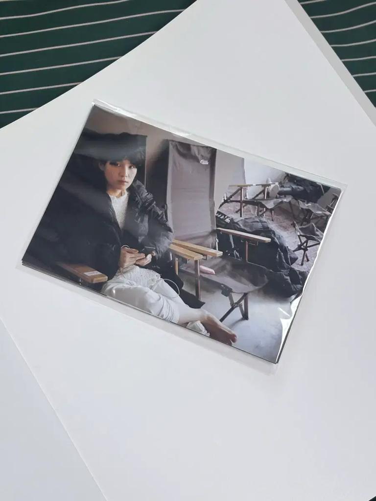 BTS merchandise, including photo albums and postcards, will be on display today.