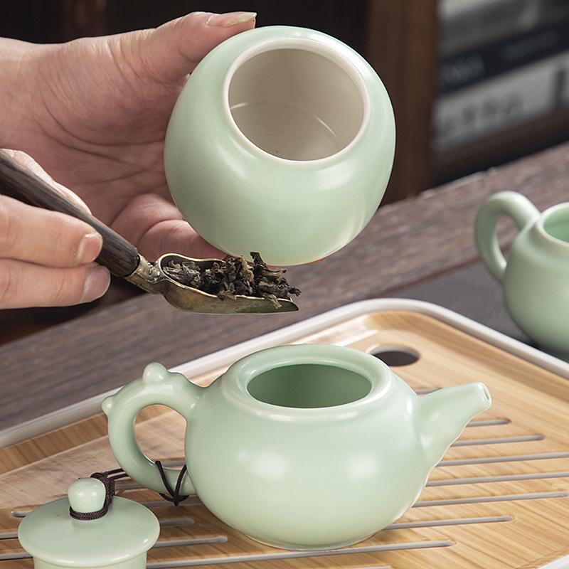 Travel ceramic Kung Fu tea set, tea tray, a full set of portable storage bags, practical business gifts for customers