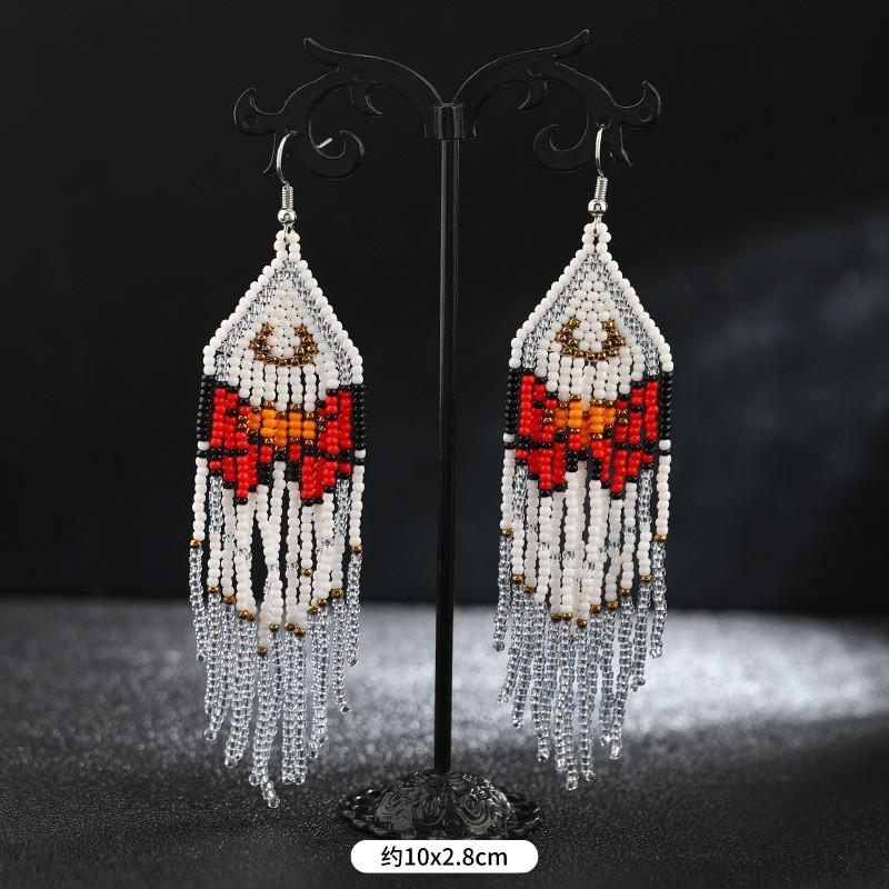 Brincos longos de borla feitos à mão com contas de arroz, nicho retrô boêmio, brincos de férias personalizados e estilosos