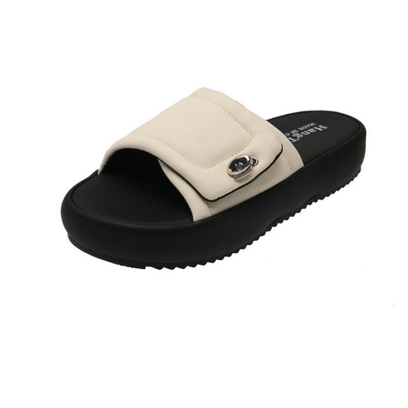 Stepping on shit-feeling thick-soled slippers for women's summer wear 2025 new non-stinky foot drag seaside beach home sandals