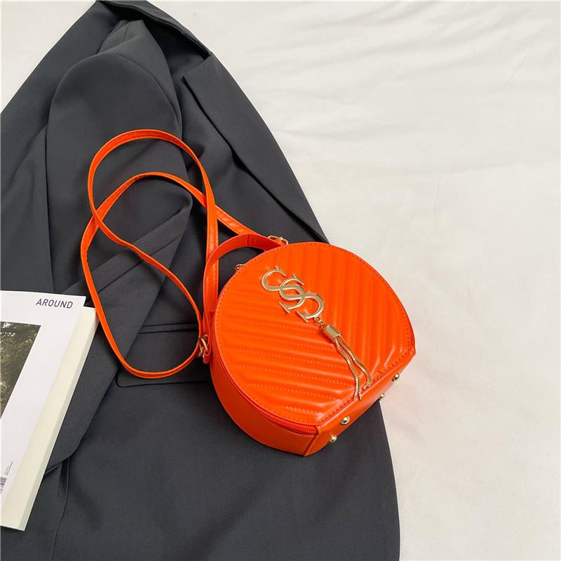 

2025 spring and summer new trendy personality small round bag beautiful casual simple messenger bag texture foreign style shoulder handbag оранжевый