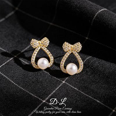 Elegant Pearl Bow Stud Earrings: Delicate, High-End Fashionable Ear Ornaments