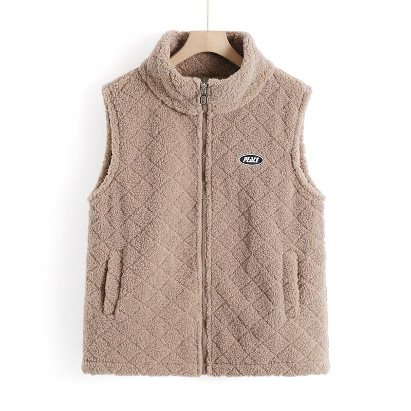 Dámská ležérní top podzimní a zimní vycpaná jednobarevná vesta větší velikosti