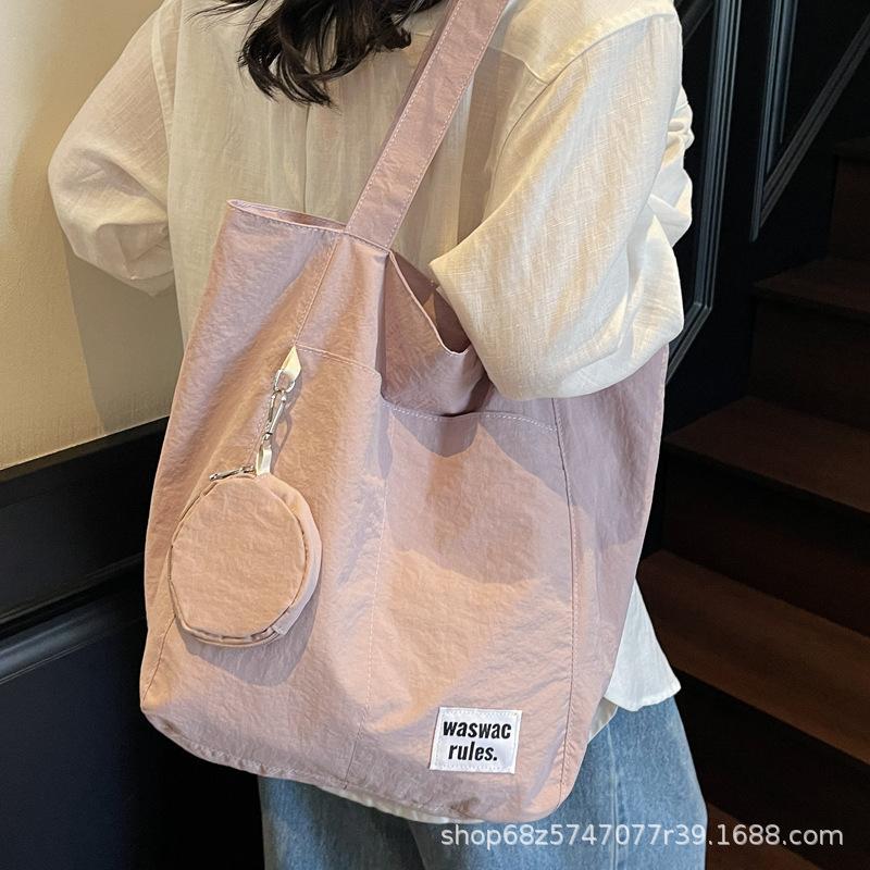 Japanese new waterproof nylon casual spring and summer shoulder bag women's design sense large-capacity commuter tote bag