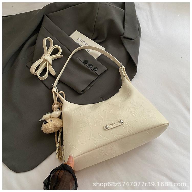 

Simple casual large-capacity bag women s 2025 new students commute to work practical soft-sided shoulder bag tide