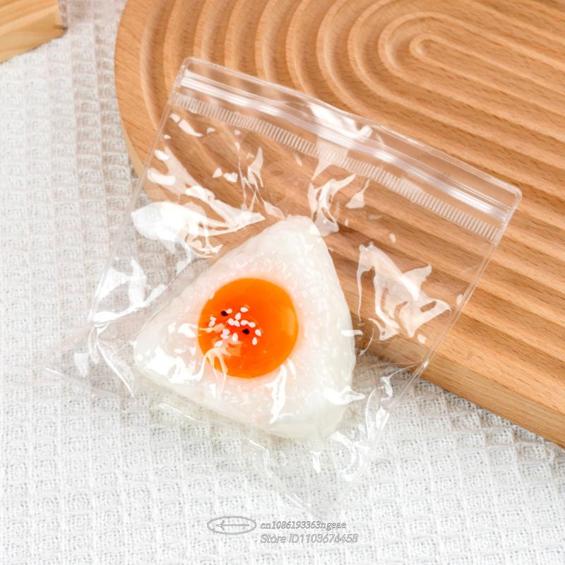 

Egg Yolk Squishy Plaything - Food-Safe Silicone Stress Ball, Kawaii Rice Sphere Popping Fidgeting Tactile Toy For Anxiety & Focus