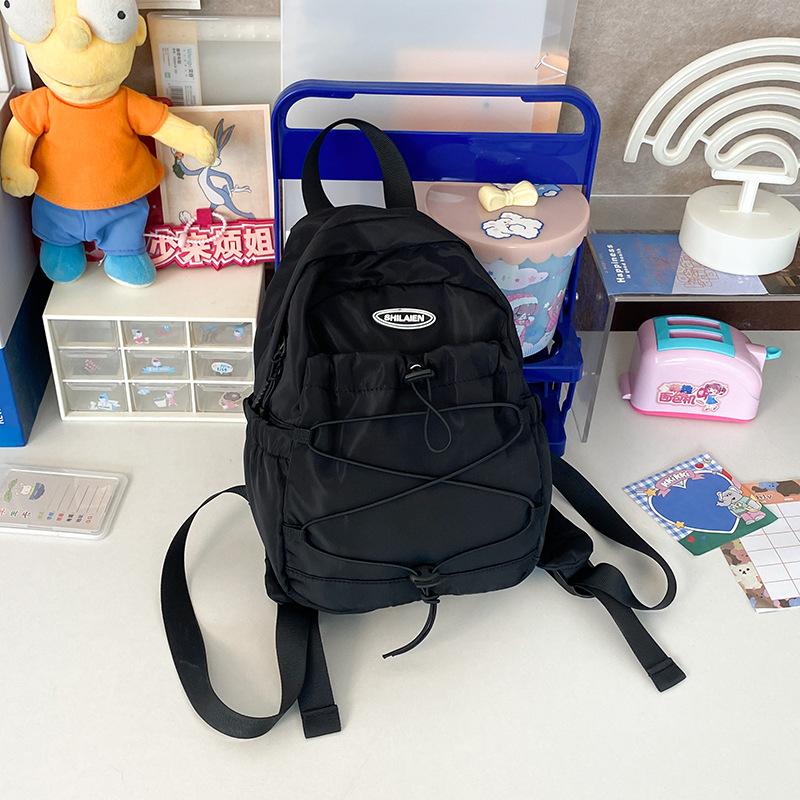 Outdoor travel bag mini fashion small backpack new Korean light boys and girls backpack junior high school hiking bag