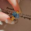 2026 Goose Yellow Pigeon Egg Rhombus Ring Retro Fashion Four Claws Inlaid Paraiba Tanzanian Blue Color Treasure Girl