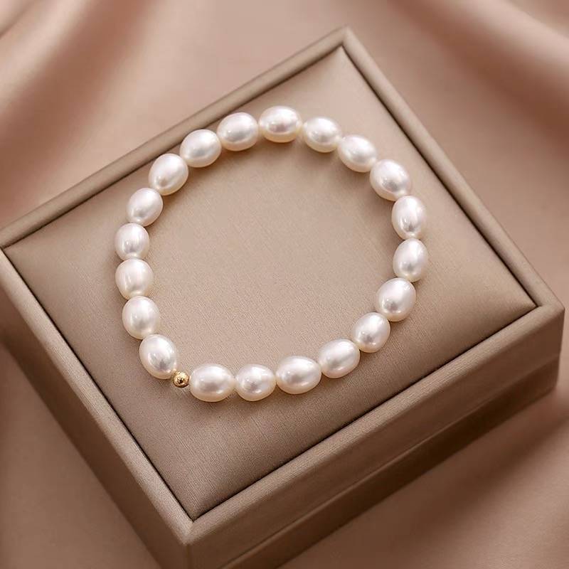 Rice Grain Freshwater Pearl Bracelet Temperament Niche Design Fashionable And Simple 18K Gold Electroplating Bracelet Elastic Adjustable