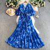 French holiday style beautiful fairy gas printing V-neck dress women's autumn and winter waist irregular elegant ruffle skirt