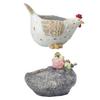 Resin flowerpot with artistic bird figure designed for garden and indoor plant decoration weather resistant and