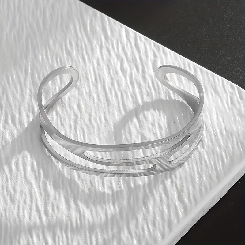 

Stainless steel hollow three-layer adjustable bracelet, simple and fashionable, suitable for both men and women срібний