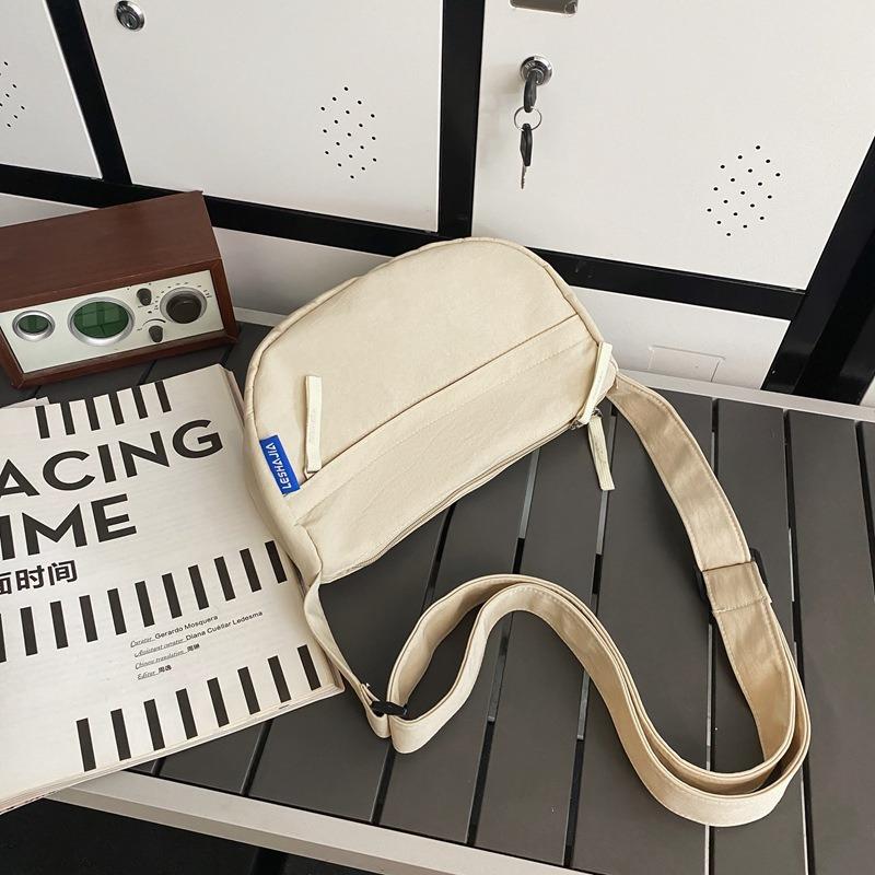 Large-capacity commuting leisure dumpling bag women's new simple and versatile shoulder messenger bag