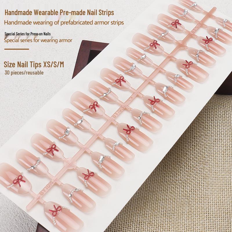 

Xiaohongshu Pearl Chain Cat Eye Wearable Nail Patches - High-End Handmade Nude Pre-Made Manicure Pieces, Sweet and Cool False Nails.