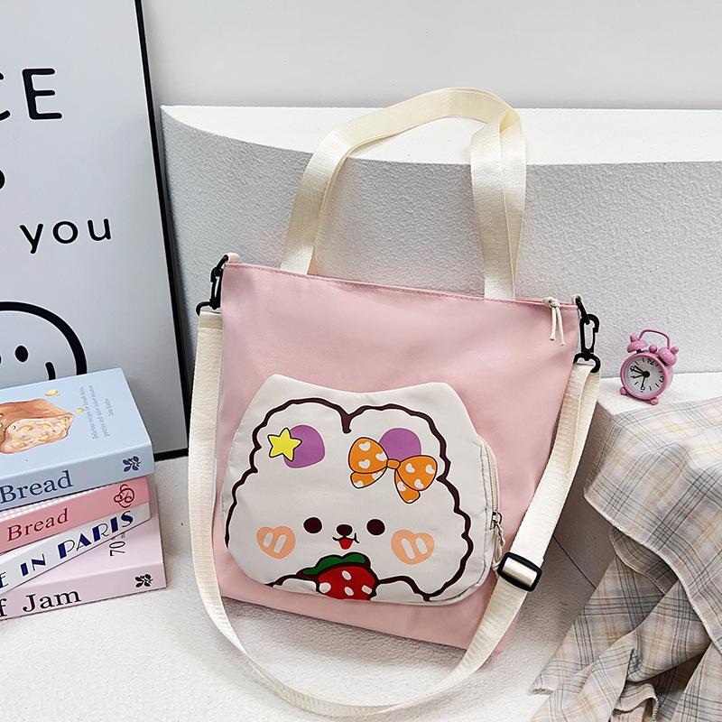 

Women s bag, tote bag, new shoulder bag, fashionable and sweet messenger bag, nylon cloth large-capacity tutoring bag. розовый