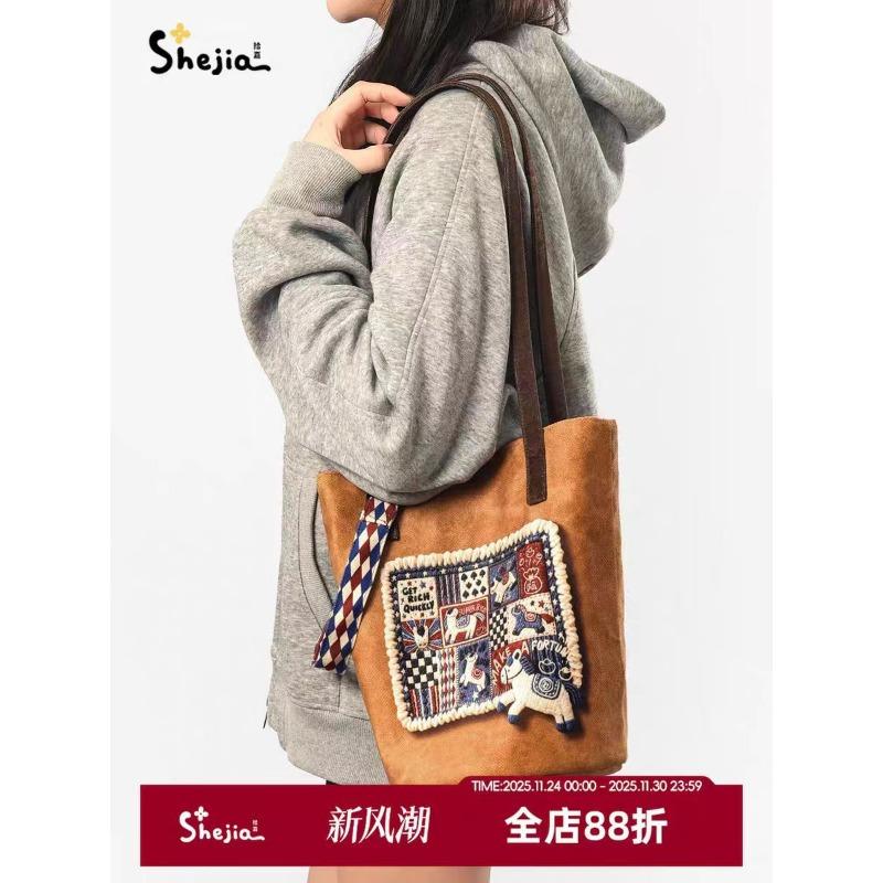 

Autumn and winter knitted suede, there will be money soon, new bucket messenger bag, women s premium large-capacity canvas bag, casual shoulder.